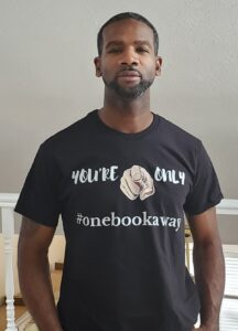 wearing you're only one book away t-shirt